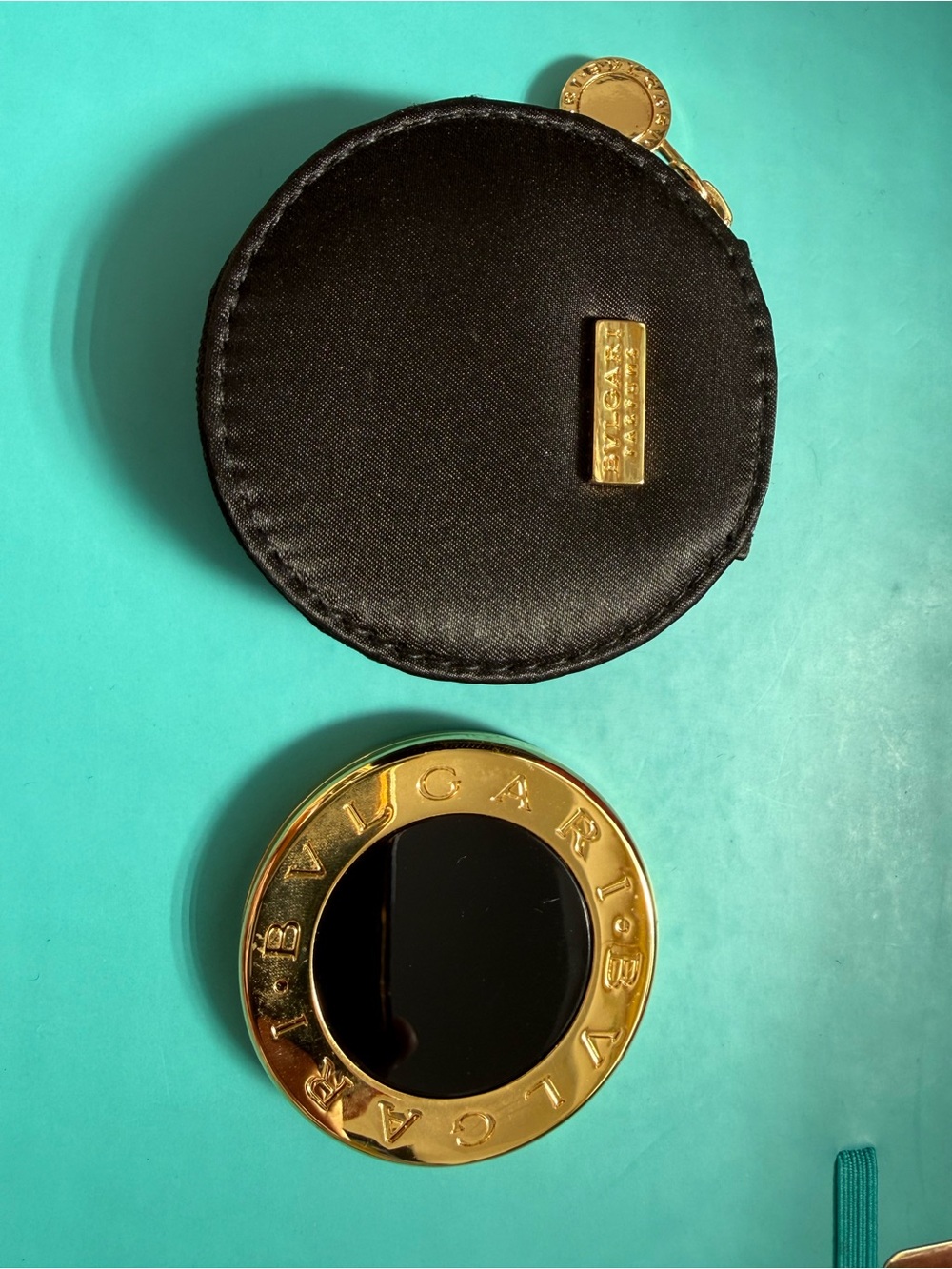 Bulgari Black and Gold Round Pouch